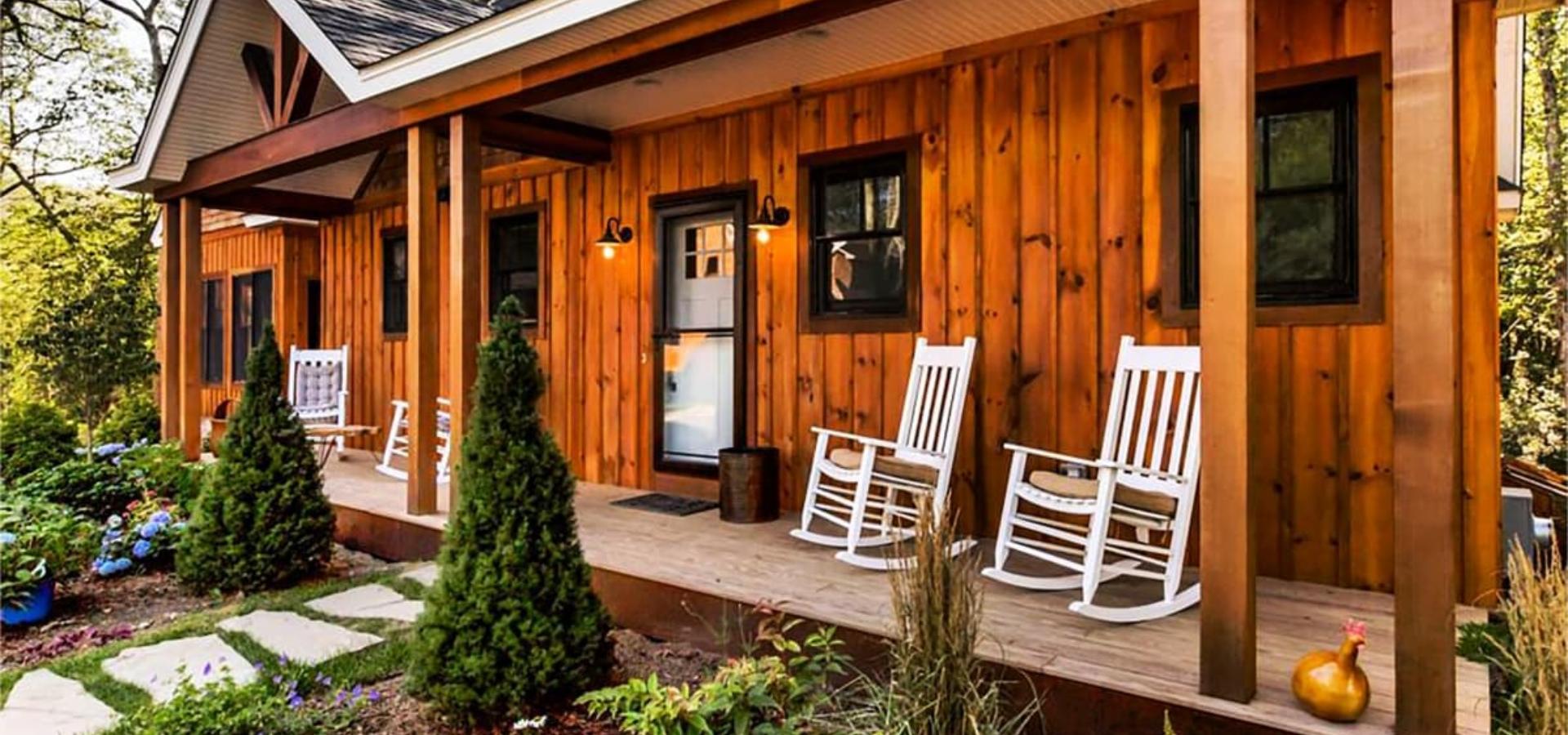 Relax in the comfort of The Preserve Resort & Spa's rustic cabin porch