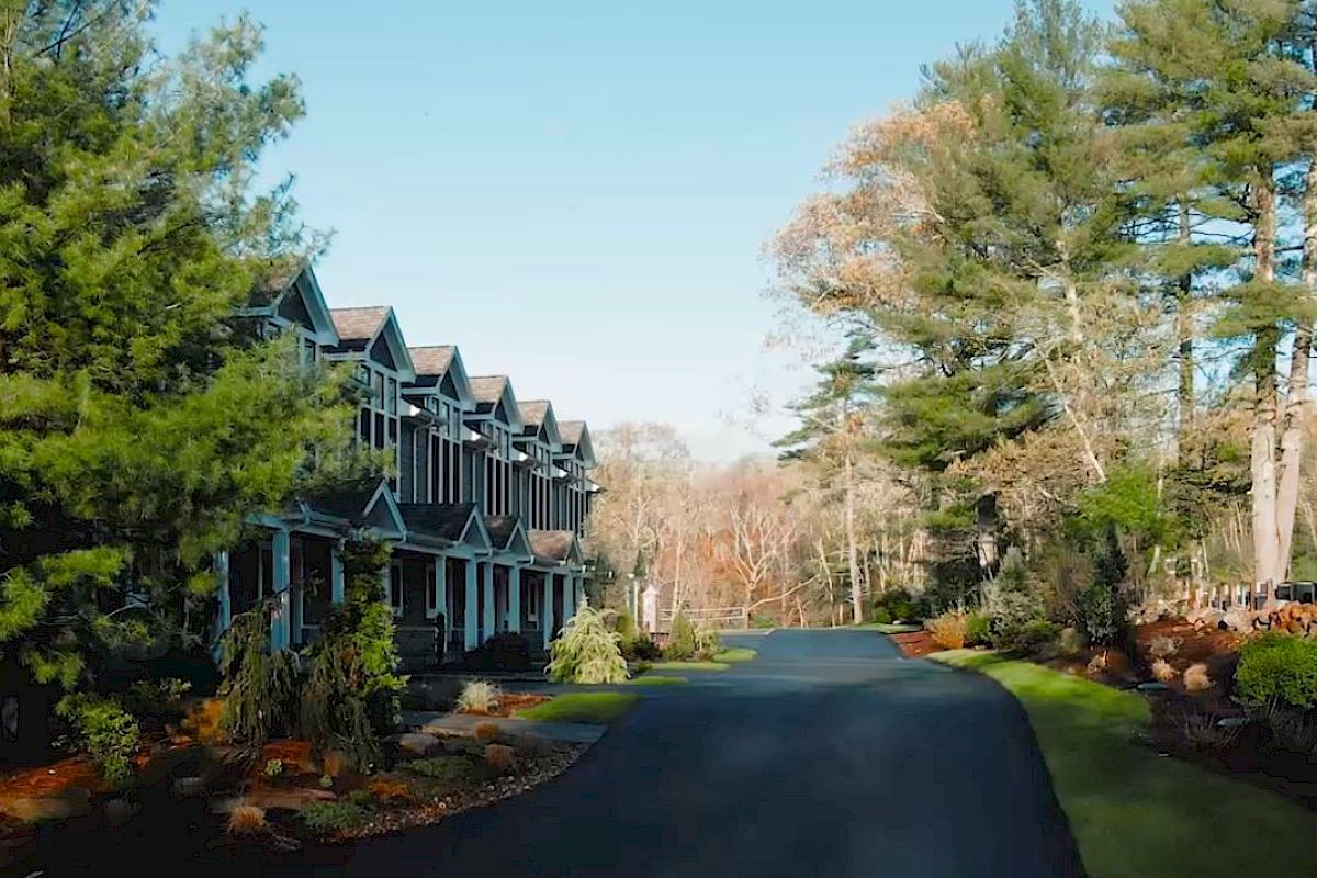 Row of luxury townhouses nestled among trees at The Preserve Sporting Club & Resort.