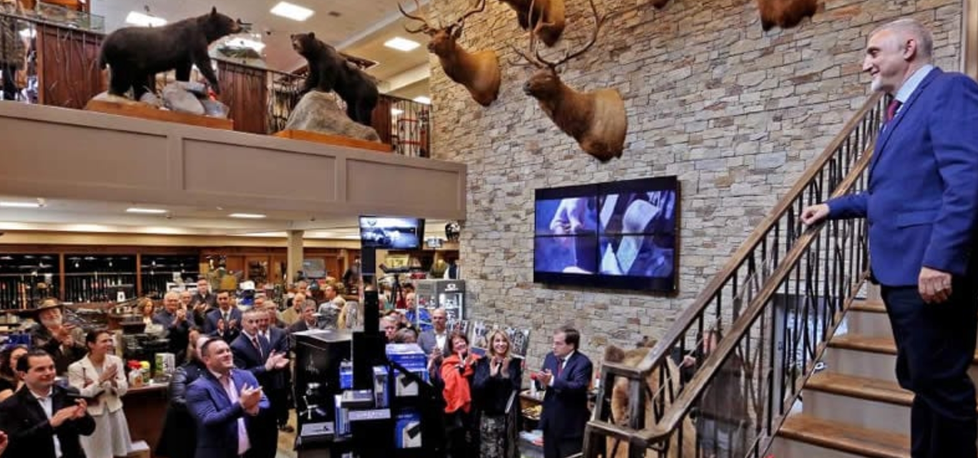 Paul Mihailides at the grand opening of The Sporting Shoppe, as featured in The Westerly Sun.