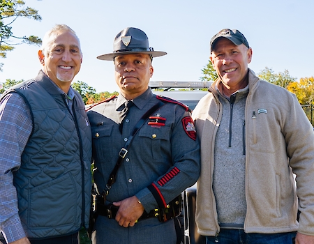 Paul Mihailides with RI Troopers at Special Olympics fundraiser.