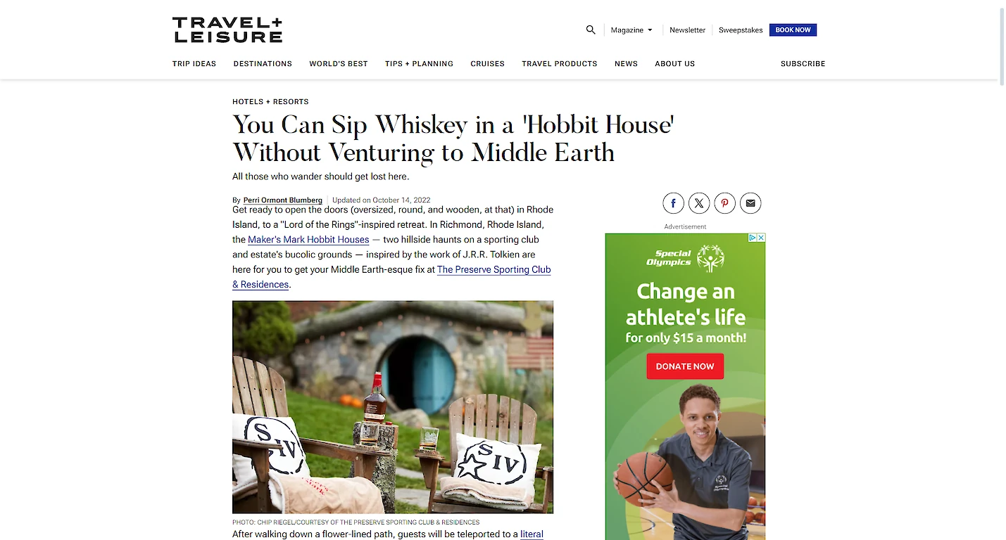This image shows a Travel + Leisure article about a 'Hobbit House' where you can sip whiskey without going to Middle Earth. There is an ad on the right.