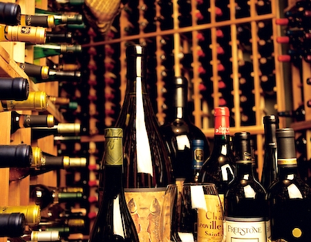 Wine cellar at The Preserve Resort & Spa showcasing a variety of fine wines.