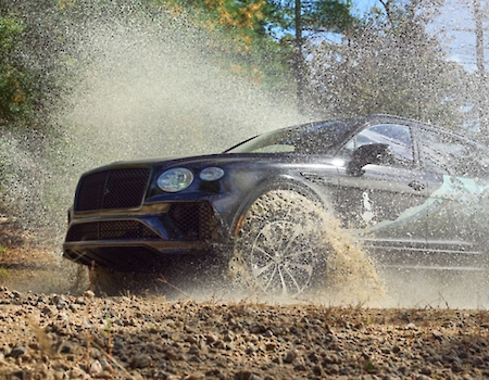The Bentley Bentayga conquering the rugged off-road terrain at The Preserve Resort & Spa