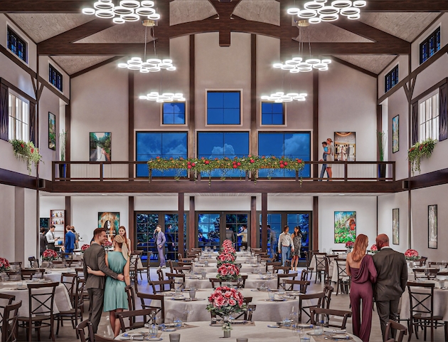 A spacious banquet hall with people mingling, elegantly decorated tables, high ceilings, chandeliers, and large windows.