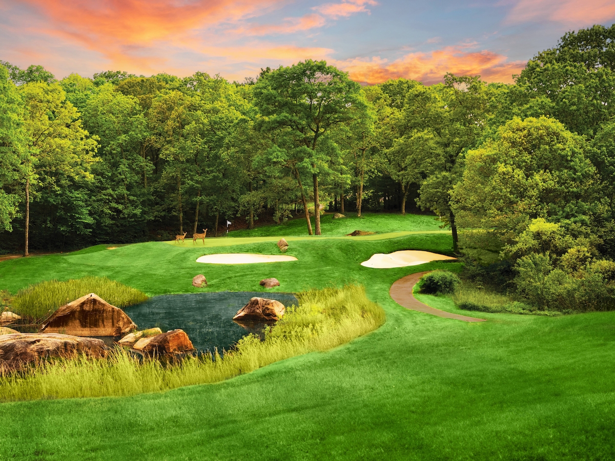 A scenic golf course surrounded by lush greenery, a small pond, and a vibrant sunset sky in the background.
